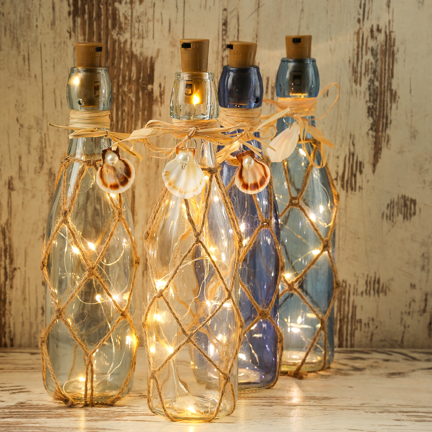 LED Dekoflasche MARITIM mit Juteseil - 10 warmweiße LED an Drahtlichterkette - H: 28cm - hellblau LED Dekoflasche MARITIM mit Juteseil - 10 warmweiße LED an Drahtlichterkette - H: 28cm - hellblau