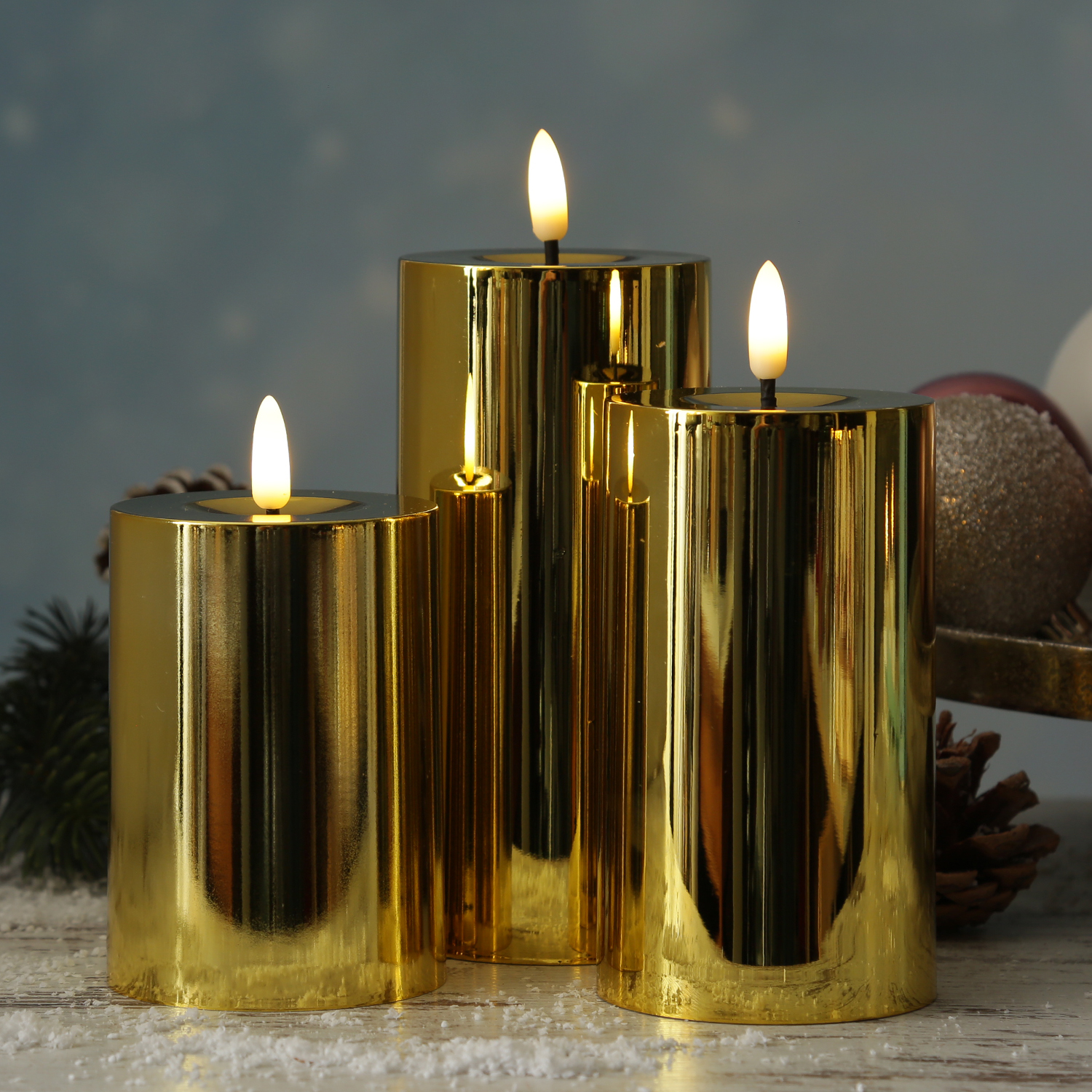 LED Kerzenset - Kunststoff - Timer - 3 Größen - D: 7,5cm - gold glänzend - 3er Set LED Kerzenset - Kunststoff - Timer - 3 Größen - D: 7,5cm - gold glänzend - 3er Set