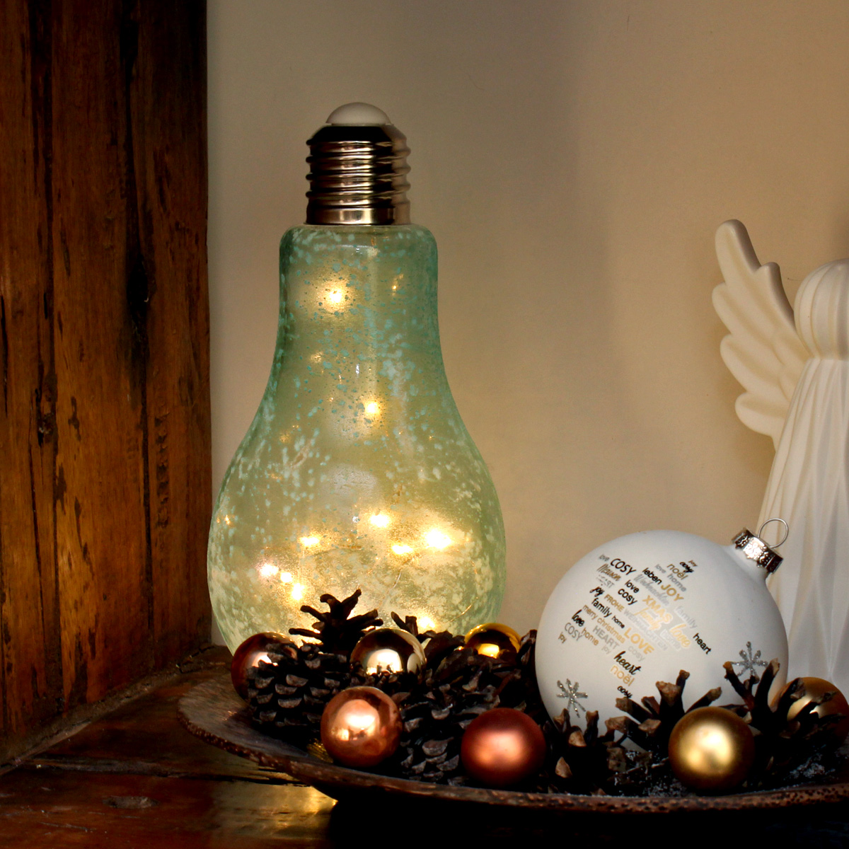 LED Glühbirne mit Lichterkette zum Stellen - H: 22cm, D: 11cm - Batteriebetrieb - eisblau gefrostet LED Glühbirne mit Lichterkette zum Stellen - H: 22cm, D: 11cm - Batteriebetrieb - eisblau  gefrostet