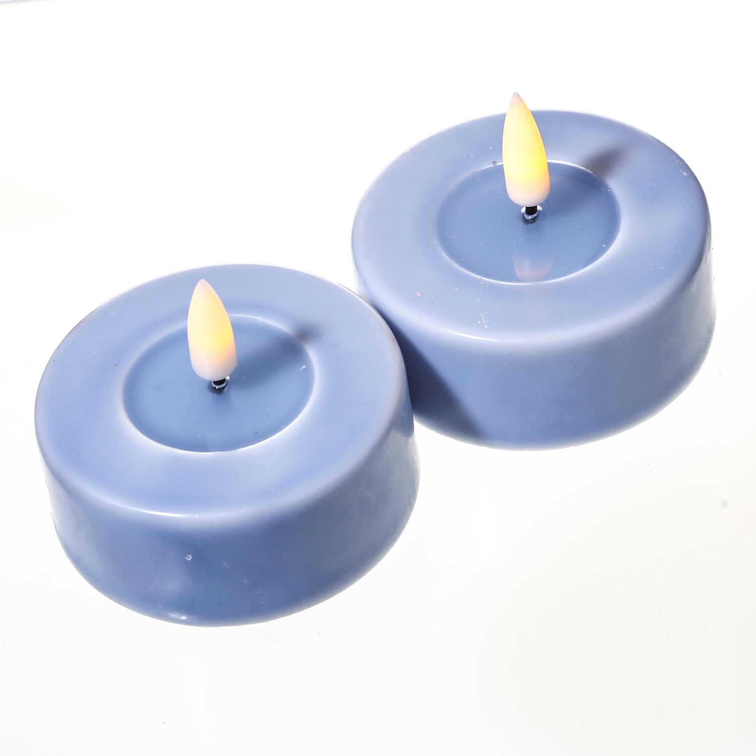 LED Teelichter MIA - Kunststoff - realistische 3D Flamme - D: 6,1cm - hellblau - 2 Stk. LED Teelichter MIA - Kunststoff - realistische 3D Flamme - D: 6,1cm - hellblau - 2 Stk.