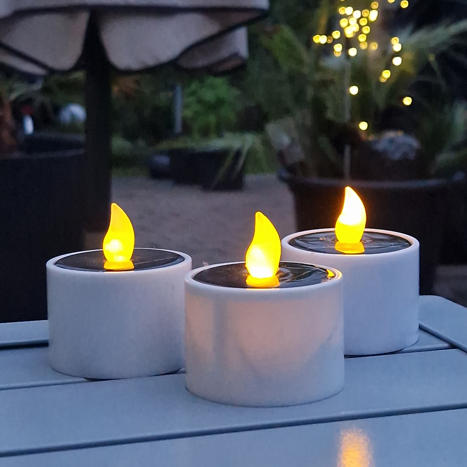 LED Solar Teelichter - orange flackernde LED - Lichtsensor - H: 6cm/D: 5,2cm - für Außen - 3er Set LED Solar Teelichter - orange flackernde LED - Lichtsensor - H: 6cm/D: 5,2cm - für Außen - 3er Set