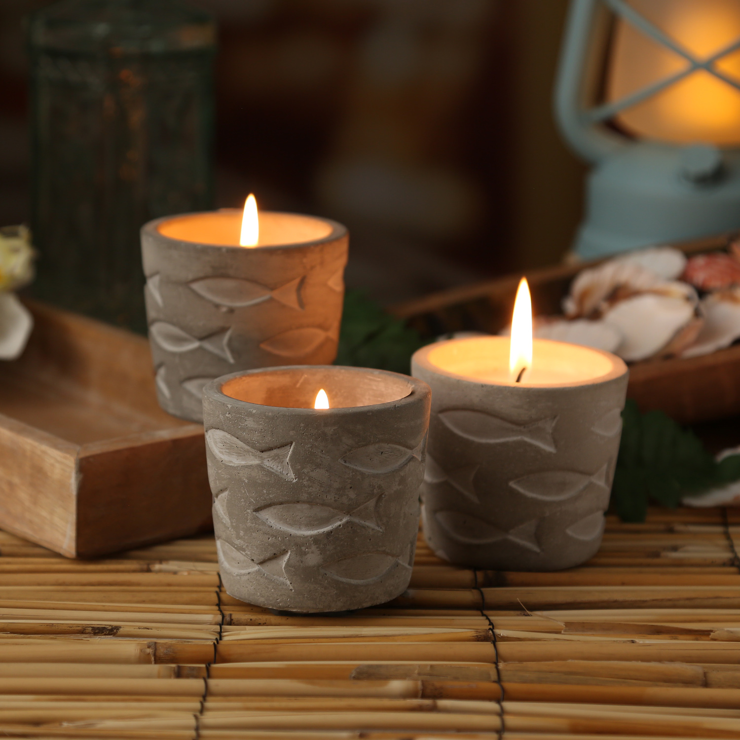 Duftkerze CITRONELLA - Echtwachs in Betontopf - Fischmuster - H: 7cm - gegen Stechmücken - hellblau