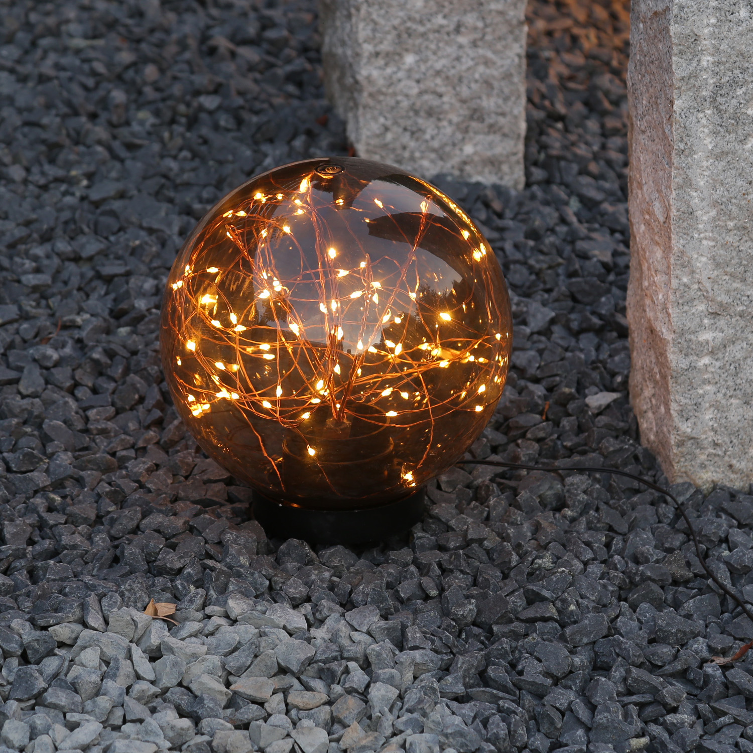 LED Kugel mit Drahtlicherkette - stehend - 80 bernsteinfarbene LED - D- 20cm - f. Aussen - rauchgrau LED Kugel mit Drahtlicherkette - stehend - 80 bernsteinfarbene LED - D- 20cm - f. Aussen - rauchgrau