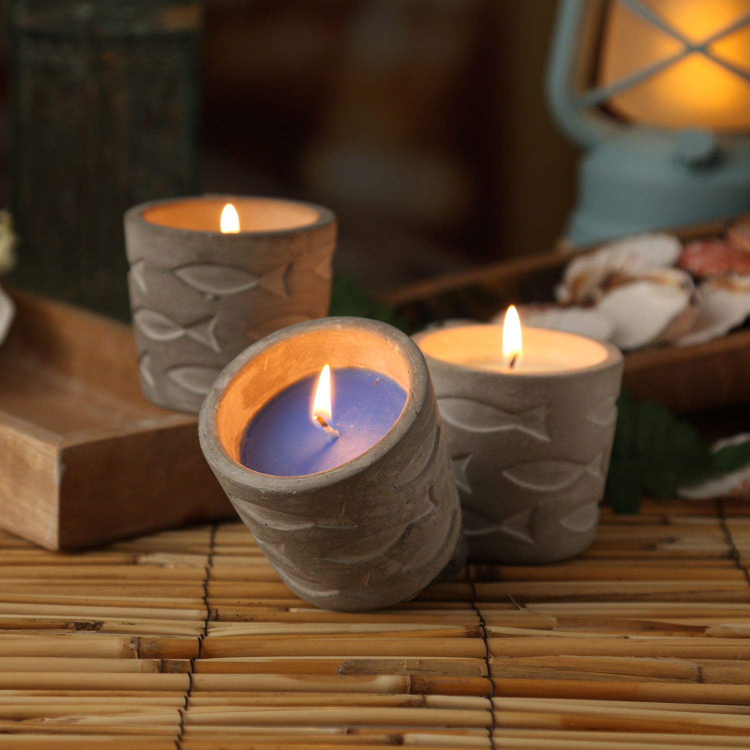 Duftkerze CITRONELLA - Echtwachs in Betontopf - Fischmuster - H: 7cm - gegen Stechmücken - blau