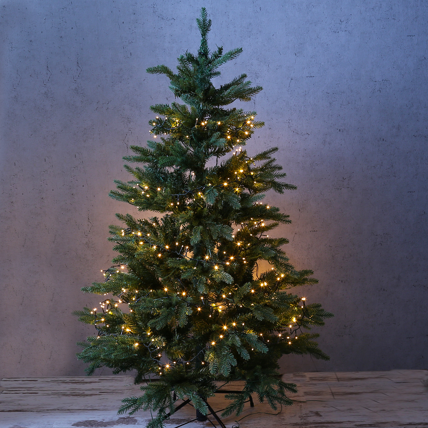 LED Baummantel Lichterkette 1-2 GLOW - 6 Stränge - 540 bernstein LED - 1,8m - Timer - Außen - grün LED Baummantel Lichterkette 1-2 GLOW - 6 Stränge - 540 bernstein LED - 1,8m - Timer - Außen - grün