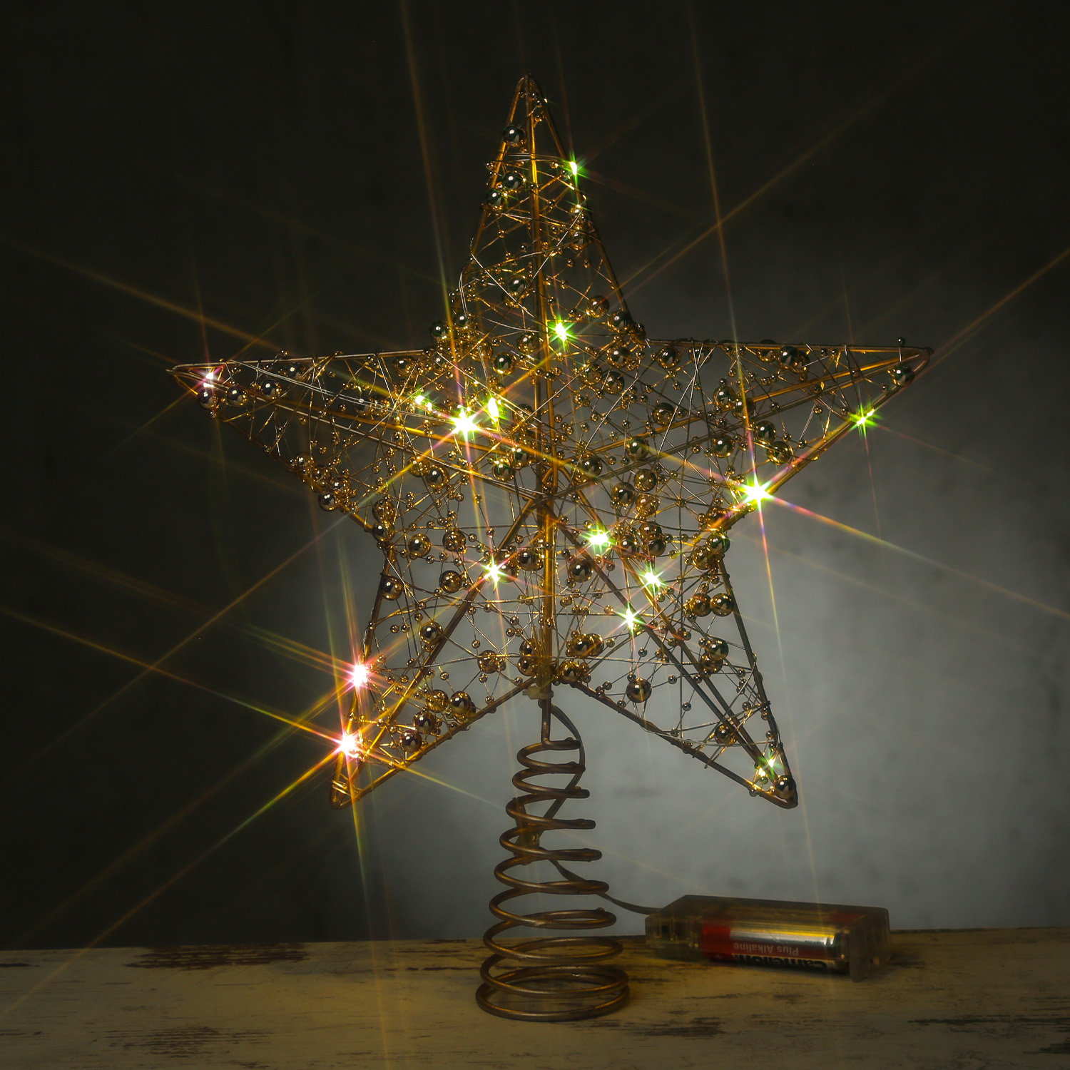 LED Weihnachtsbaumspitze Stern mit Perlen - 15 warmweiße LED - Batterie - Timer - H: 29cm - gold