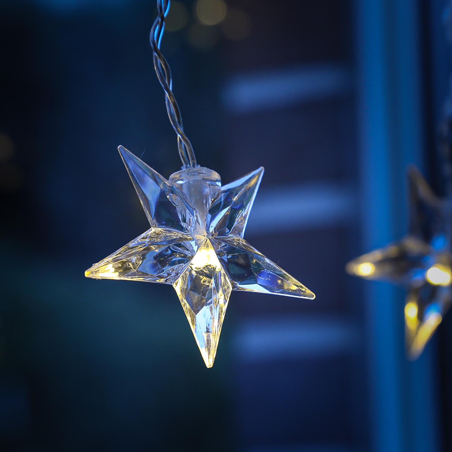 LED Lichtervorhang STERNE - 64 warmweiße LED - L: 1,2m - H: 1m - Trafo - für Innen - transparent LED Lichtervorhang STERNE - 64 warmweiße LED - L: 1,2m - H: 1m - Trafo - für Innen - transparent