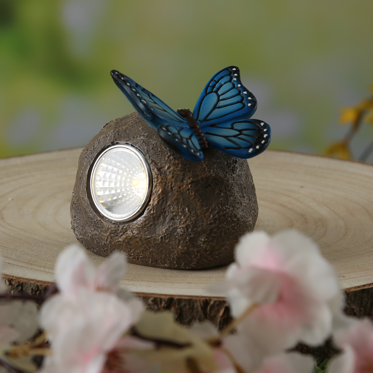 LED Solar Stein mit blauem Schmetterling - Gartenfigur - warmweiße LED - H: 9cm - Lichtsensor