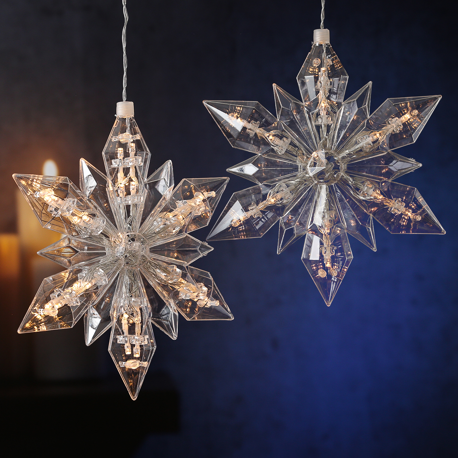 LED Weihnachtssterne aus Acryl - 2x 25 warmweiße LED - Timer - Batterie - transparent - 2er Set