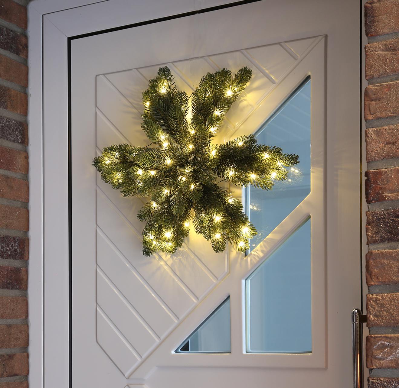 Tannenkranz - sternförmig - Kunststoff - 50 warmweiße LED - D: 50cm - Timer - Batterie - grün Tannenkranz - sternförmig - Kunststoff - 50 warmweiße LED - D: 50cm - Timer - Batterie - grün