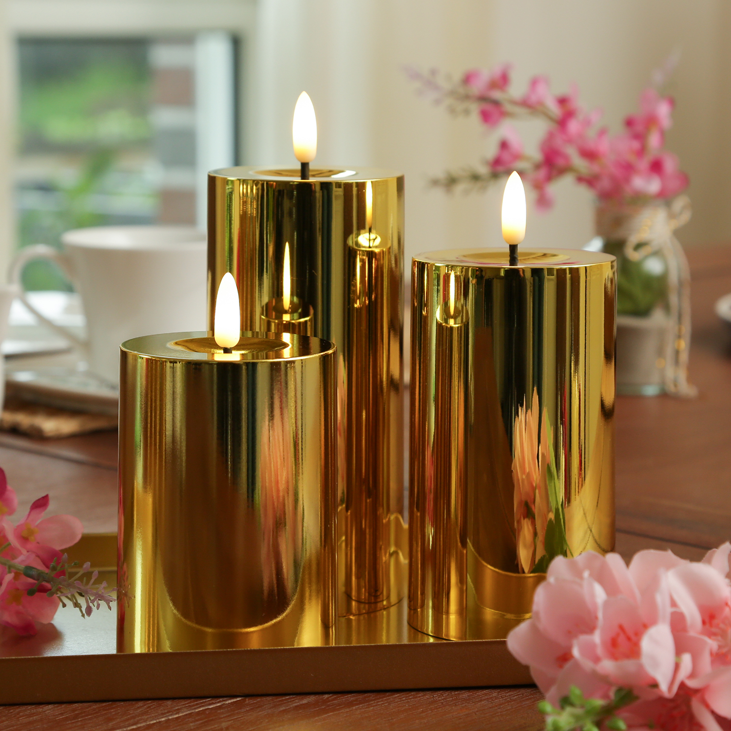 LED Kerzenset - Kunststoff - Timer - 3 Größen - D: 7,5cm - gold glänzend - 3er Set LED Kerzenset - Kunststoff - Timer - 3 Größen - D: 7,5cm - gold glänzend - 3er Set