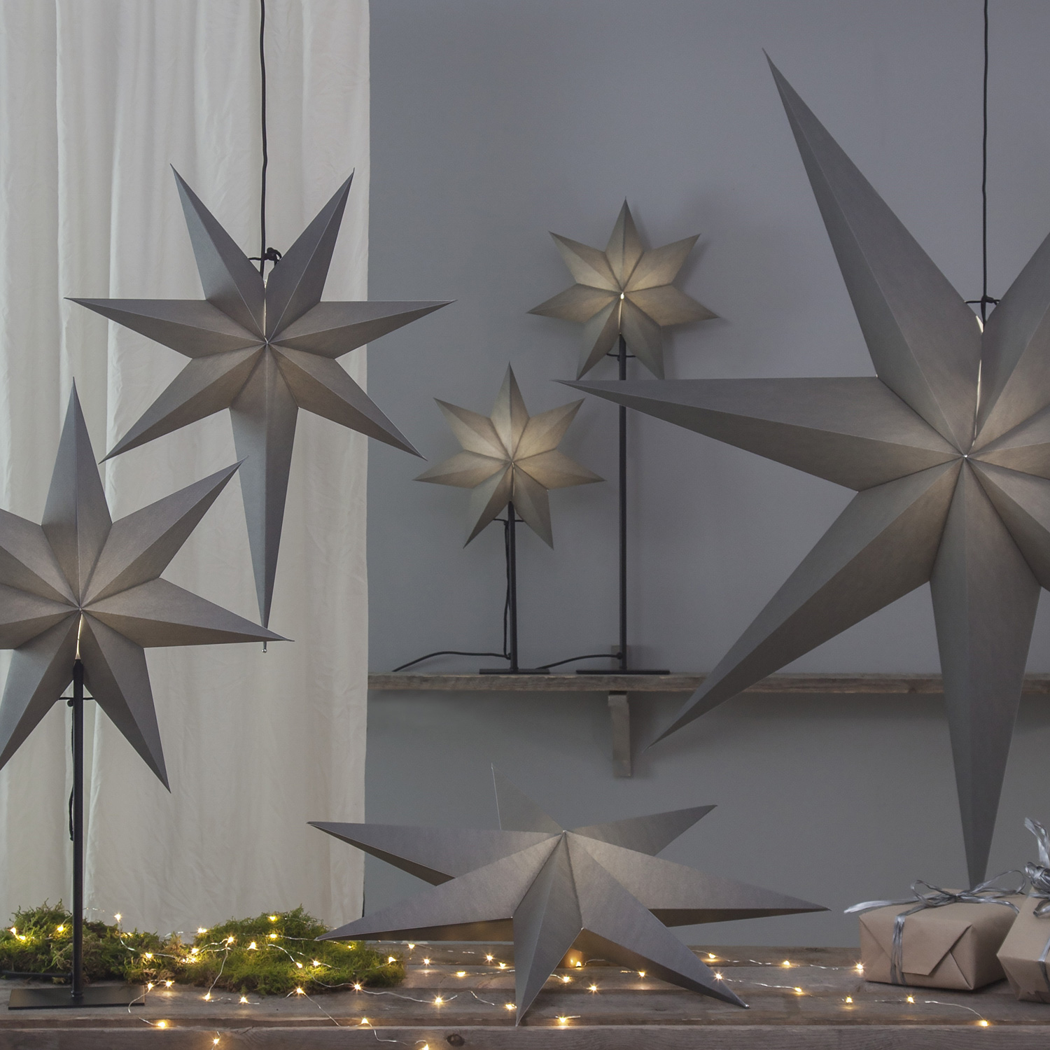 Papierstern "Ozen" - hängend - 7-zackig - Ø 55cm, H: 65cm - E14 Fassung - inkl. Kabel - anthrazit Papierstern "Ozen" - hängend - 7-zackig - Ø 55cm, H: 65cm - E14 Fassung - inkl. Kabel - anthrazit