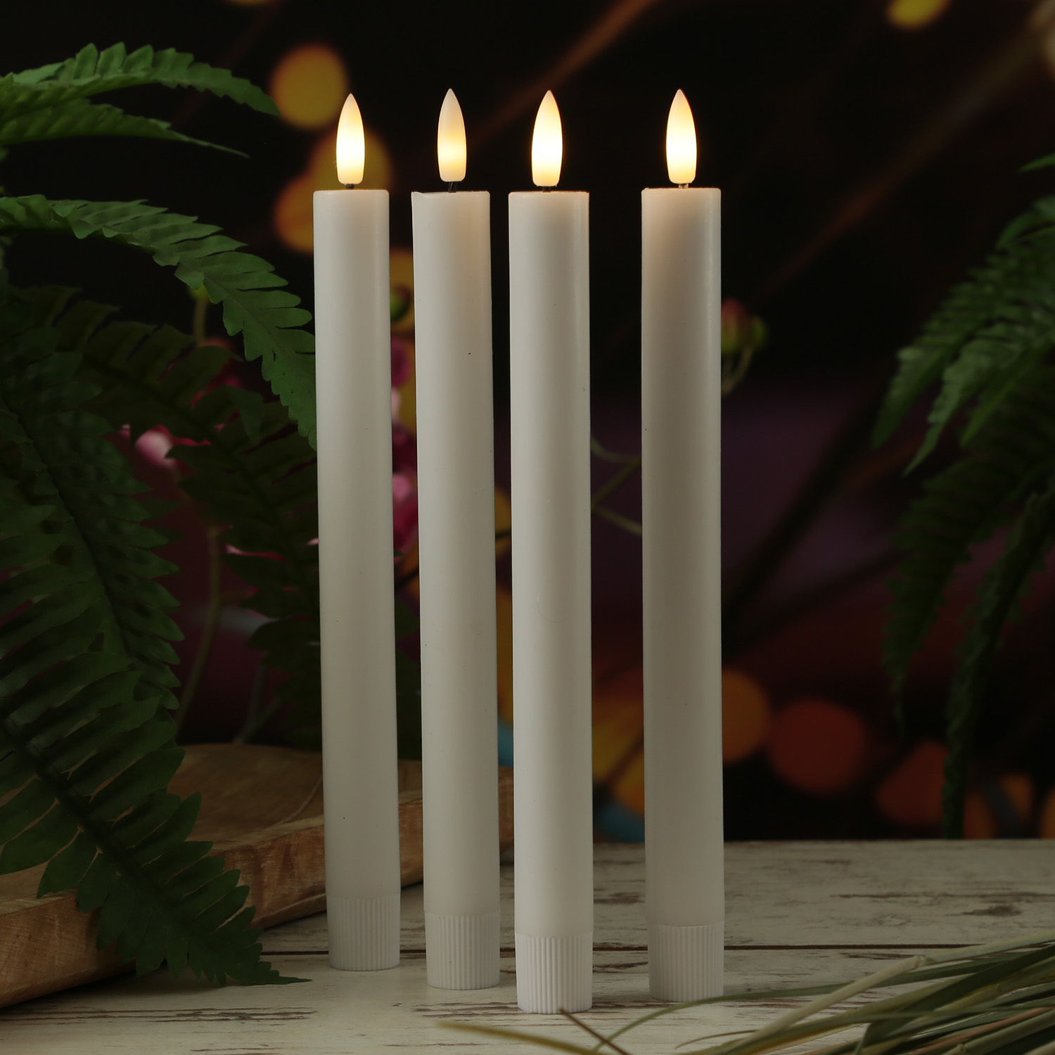 LED Stabkerzen LISA - Echtwachs - mit Ladestation - inkl. Fernbedienung - H: 25cm - weiß - 4er Set LED Stabkerzen LISA - Echtwachs - mit Ladestation - inkl. Fernbedienung - H: 25cm - weiß - 4er Set