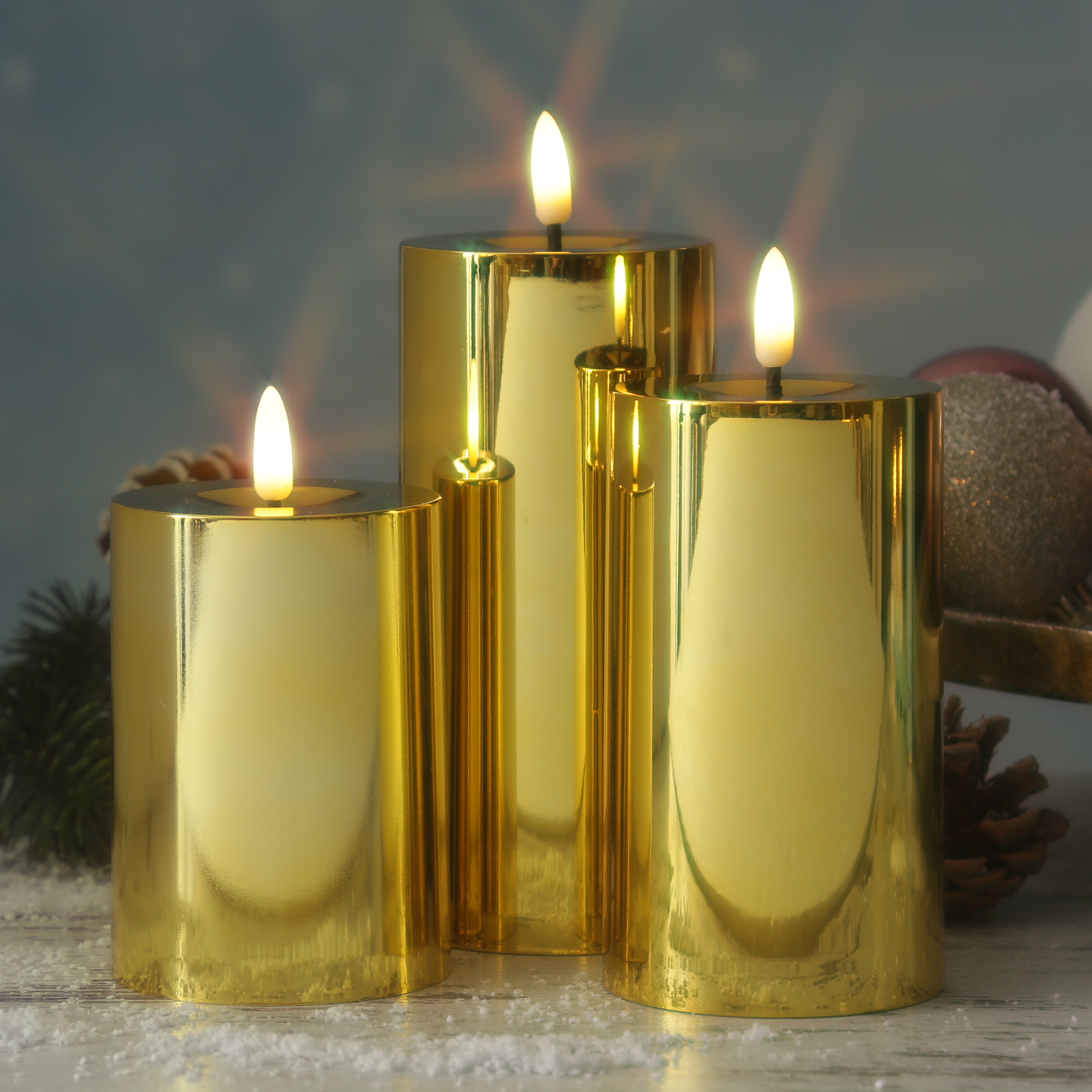 LED Kerzenset - Kunststoff - Timer - 3 Größen - D: 7,5cm - gold glänzend - 3er Set LED Kerzenset - Kunststoff - Timer - 3 Größen - D: 7,5cm - gold glänzend - 3er Set