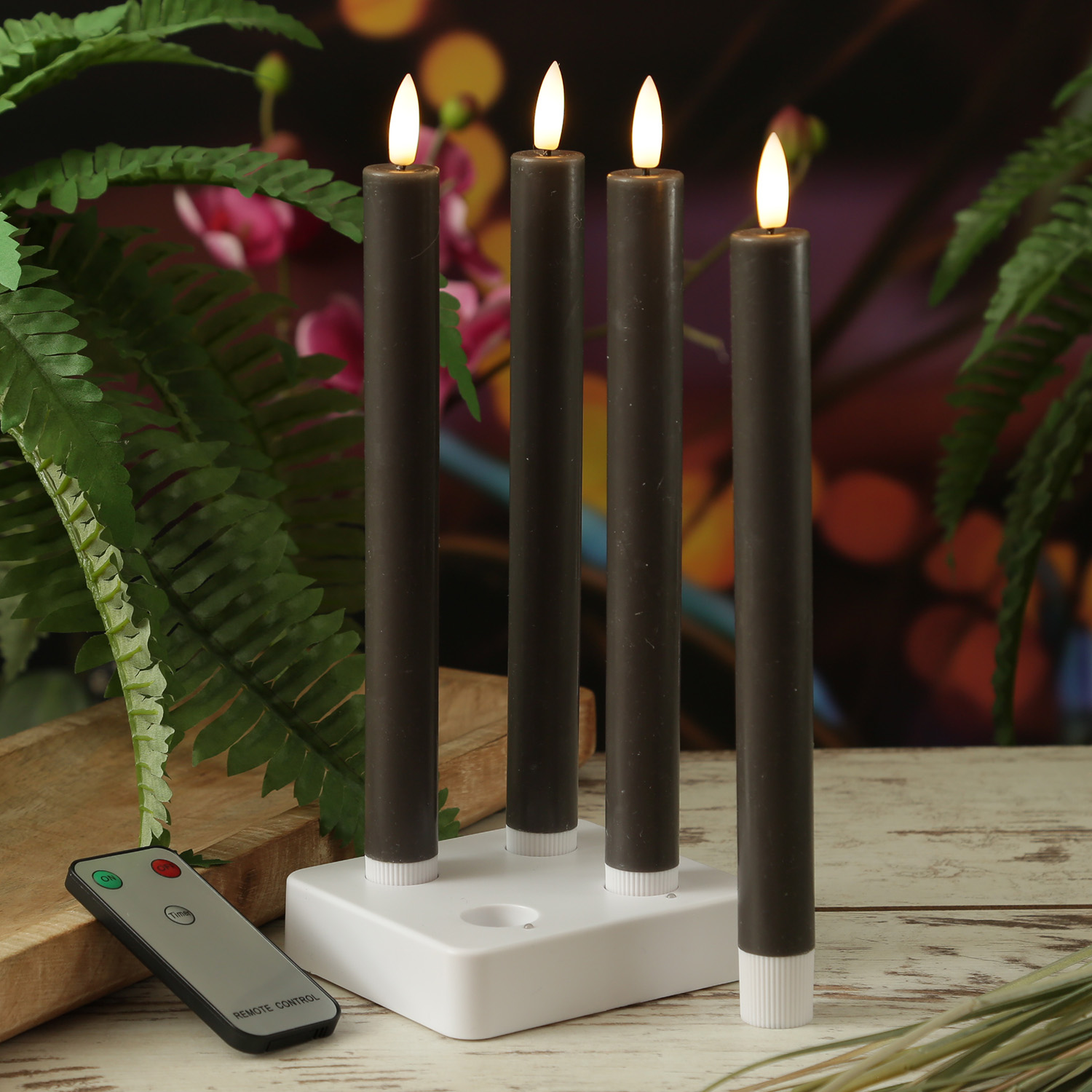 LED Stabkerzen LISA - Echtwachs - mit Ladestation - inkl. Fernbedienung - H: 25cm - grau - 4er Set LED Stabkerzen LISA - Echtwachs - mit Ladestation - inkl. Fernbedienung - H: 25cm - grau - 4er Set