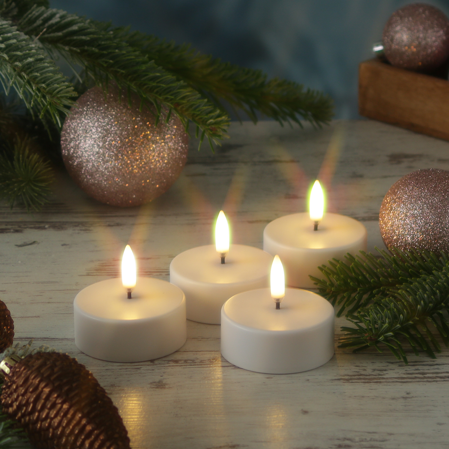LED Maxi Teelichter - 4 wiederaufladbare LED Teelichter - D 6cm - Timer - weiß - für Außen LED Maxi Teelichter - 4 wiederaufladbare LED Teelichter - D 6cm - Timer - weiß - für Außen