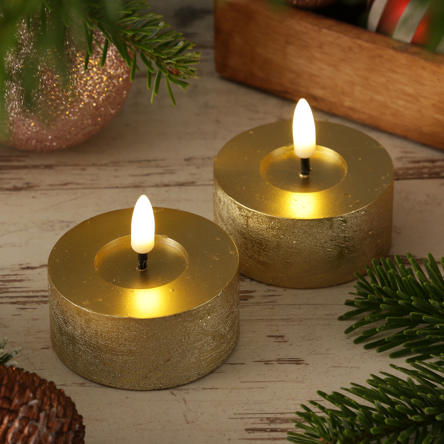 LED Maxi Teelichter LINA - Rustik-Optik - Echtwachs - Timer - D: 7cm - H: 6cm - gold - 2 Stück LED Maxi Teelichter LINA - Rustik-Optik - Echtwachs - Timer - D: 7cm - H: 6cm - gold - 2 Stück