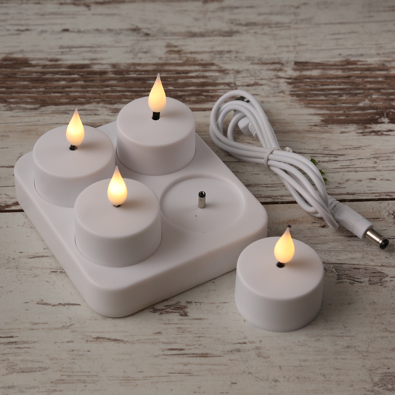 LED Teelichter - 4 wiederaufladbare LED Teelichter mit Ladestation - D: 4cm - flackernd - weiß LED Teelichter - 4 wiederaufladbare LED Teelichter mit Ladestation - D: 4cm - flackernd - weiß